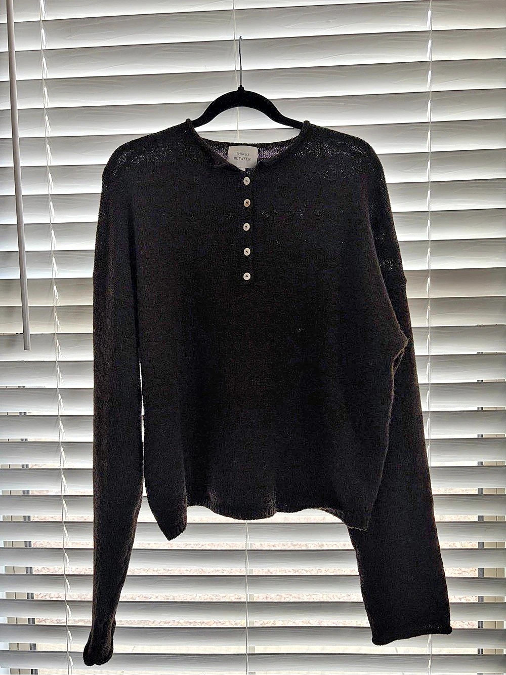 Things between brown sweater
